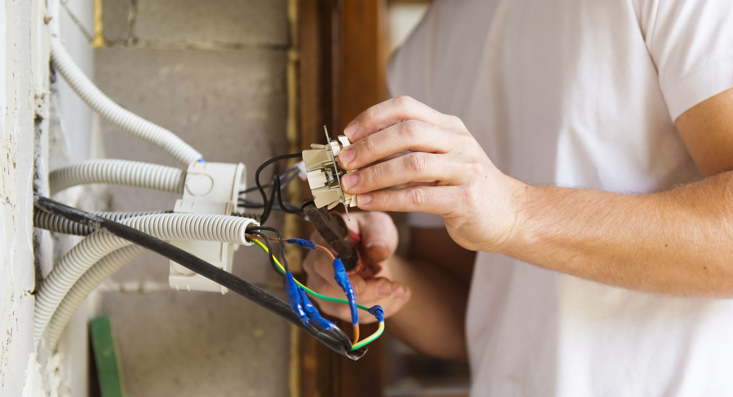 Electrician wiring in a new home