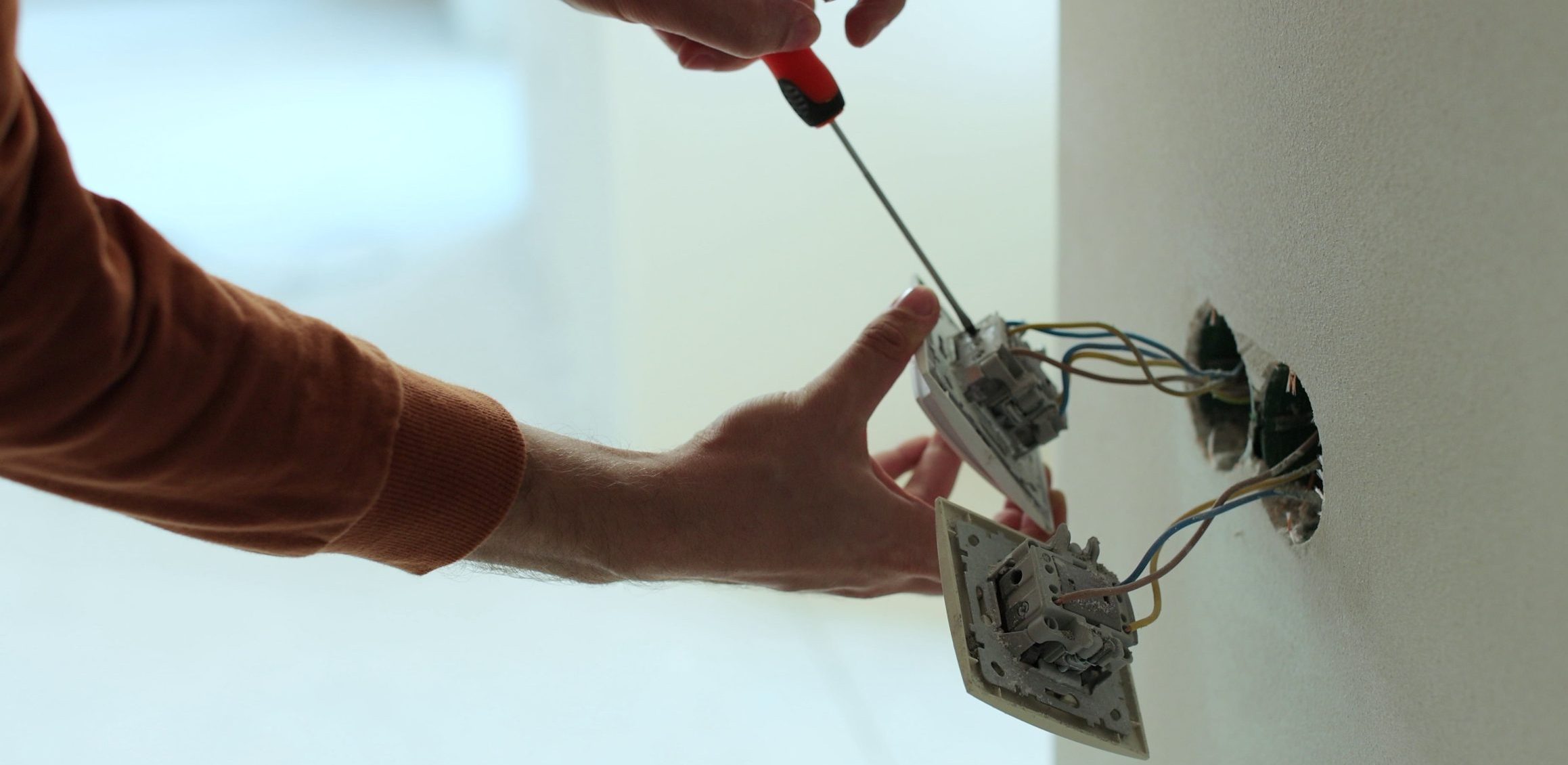 Light switch service electrician for an electrical system