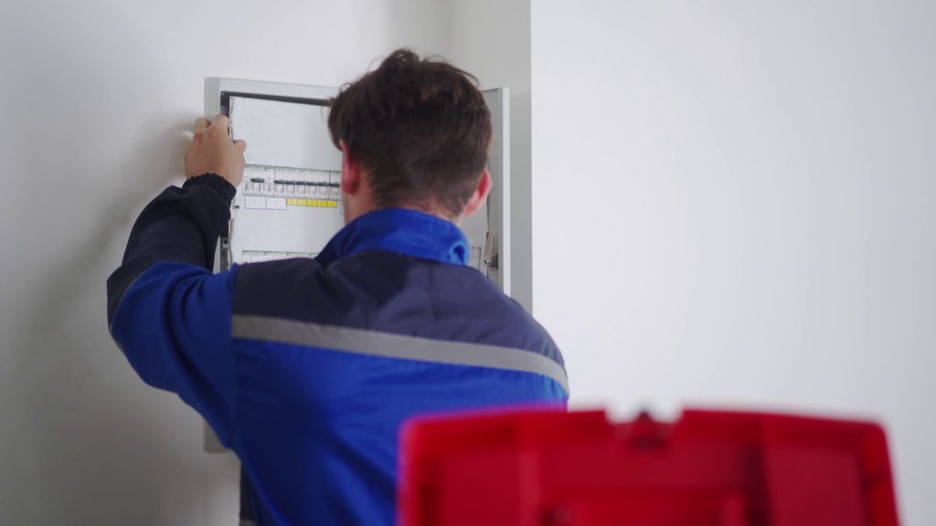 Home electrical inspection on a fuse box