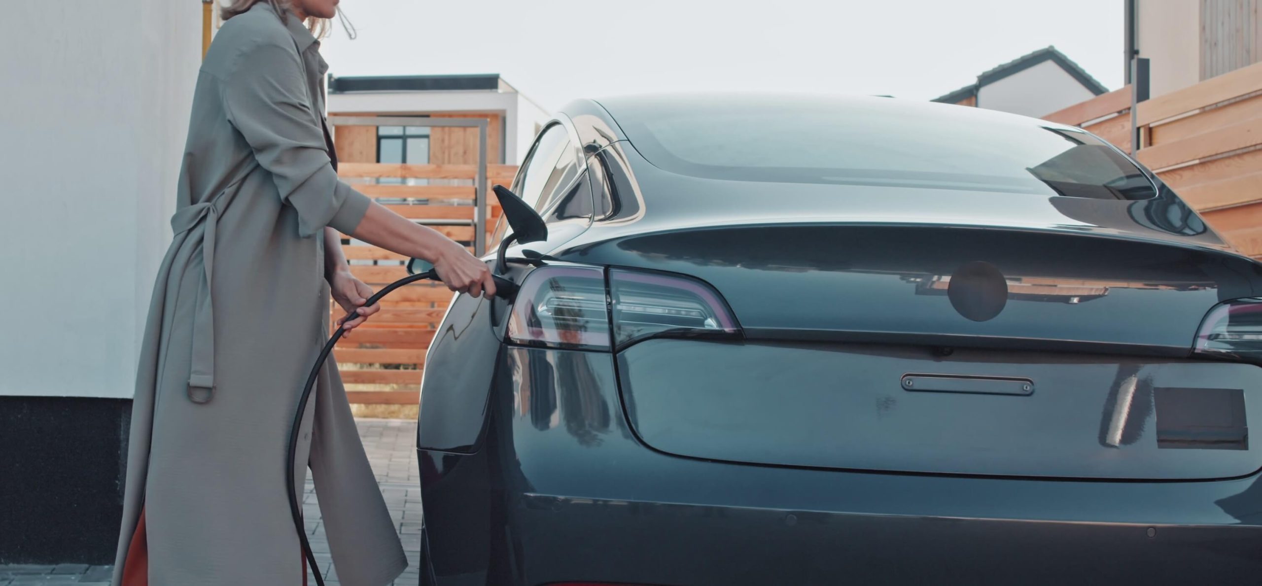 Electric vehicle being charged with a home EV charging station
